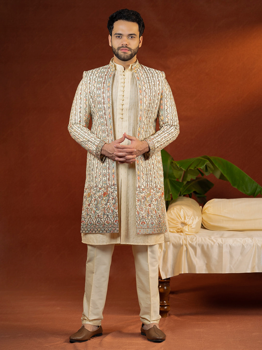 Cream Heavy Embroidered Front Open Sleeveless Jacket Kurta Set