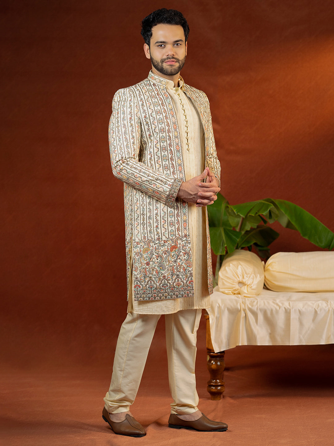 Cream Heavy Embroidered Front Open Sleeveless Jacket Kurta Set